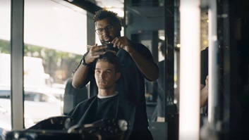 photo of men getting their haircut.