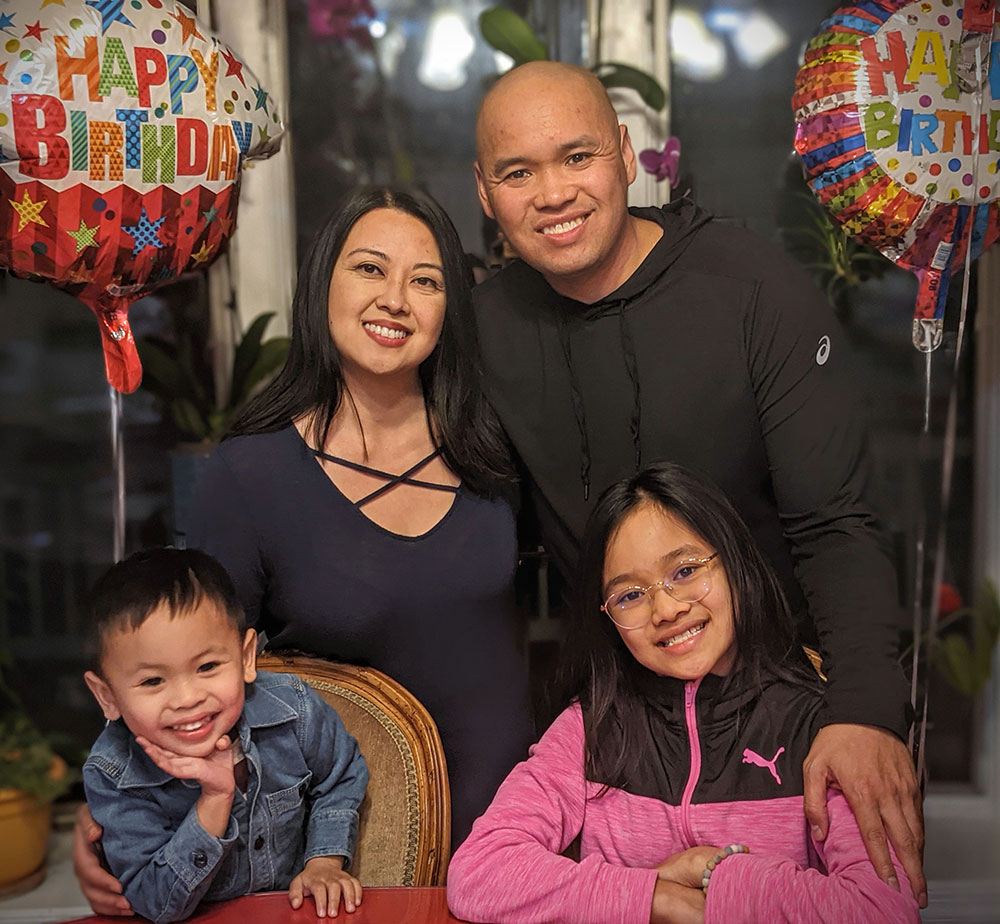 Paulo, Christine and his two children, Paulo Jr. and Ava, celebrating Christine’s birthday this past March. 